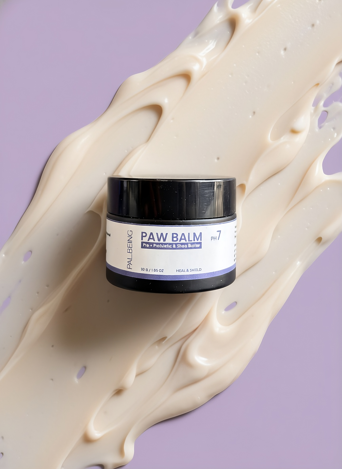 Jar of paw balm on a purple background with paw balm spread out.